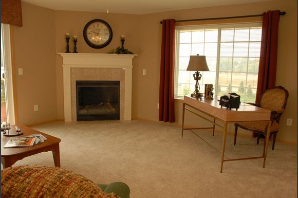 Living Rooms With Fireplace at Wildwood Highlands Apartments & Townhomes 55+, Menomonee Falls, WI,53051